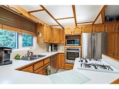 40 28161 Hwy 596, Rural Red Deer County, AB - Indoor Photo Showing Kitchen With Double Sink