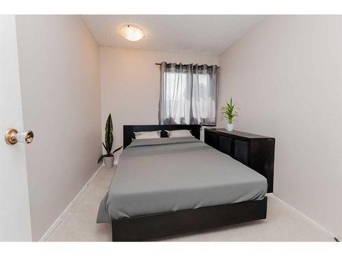 100 Mclevin Crescent, Red Deer, AB - Indoor Photo Showing Bedroom