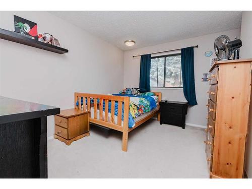 100 Mclevin Crescent, Red Deer, AB - Indoor Photo Showing Bedroom