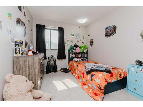 100 Mclevin Crescent, Red Deer, AB - Indoor Photo Showing Bedroom