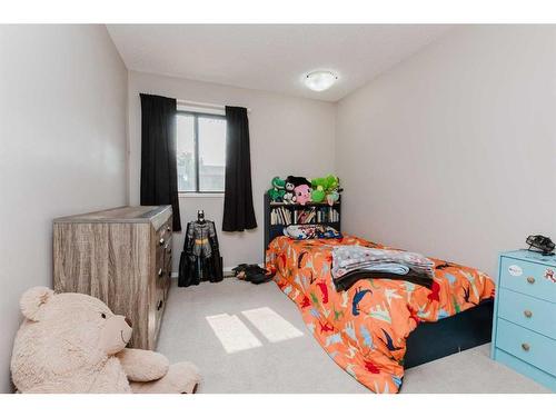 100 Mclevin Crescent, Red Deer, AB - Indoor Photo Showing Bedroom