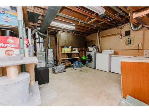 100 Mclevin Crescent, Red Deer, AB - Indoor Photo Showing Laundry Room