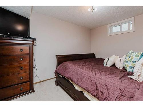 100 Mclevin Crescent, Red Deer, AB - Indoor Photo Showing Bedroom