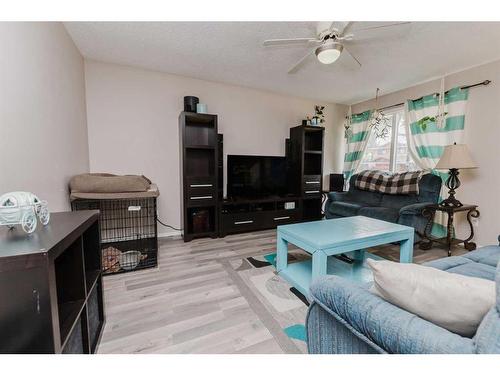 100 Mclevin Crescent, Red Deer, AB - Indoor Photo Showing Living Room