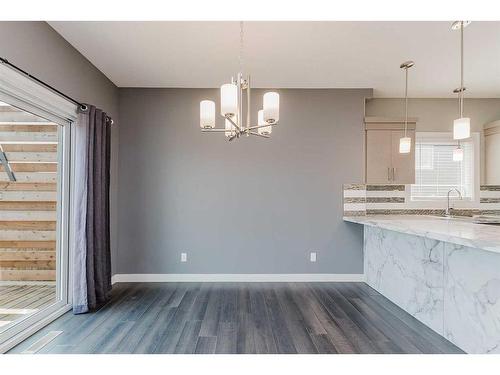 59 Village Crescent, Red Deer, AB - Indoor Photo Showing Kitchen