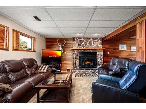 6515 50 Avenue, Camrose, AB - Indoor Photo Showing Living Room With Fireplace