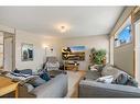 4 Arnold Close, Red Deer, AB  - Indoor Photo Showing Living Room 