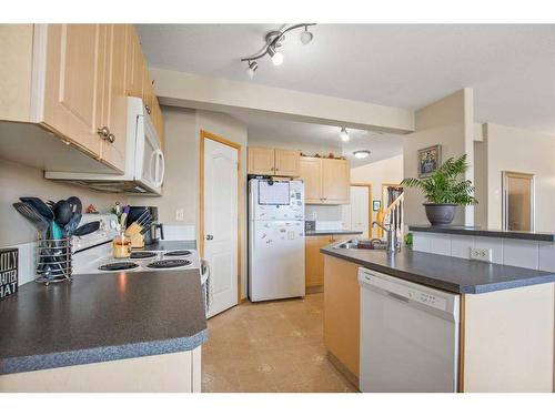 4 Arnold Close, Red Deer, AB - Indoor Photo Showing Kitchen With Double Sink