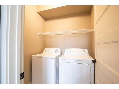 61 Crimson Court, Blackfalds, AB - Indoor Photo Showing Laundry Room