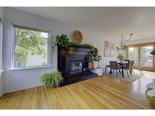 3909 50A Street, Red Deer, AB - Indoor Photo Showing Living Room With Fireplace