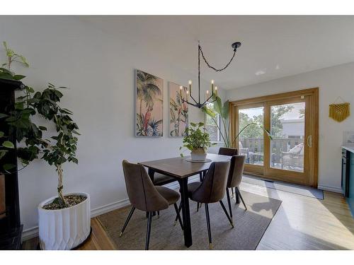 3909 50A Street, Red Deer, AB - Indoor Photo Showing Dining Room With Fireplace