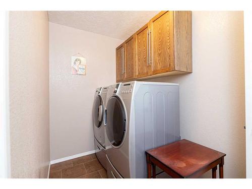 7101 Cobb Street, Lacombe, AB - Indoor Photo Showing Laundry Room