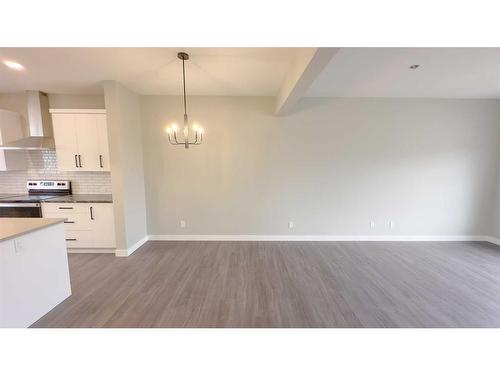 50 Inglis Crescent, Sylvan Lake, AB - Indoor Photo Showing Kitchen With Double Sink