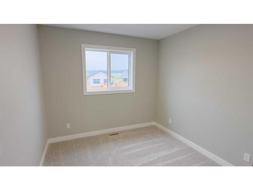 50 Inglis Crescent, Sylvan Lake, AB - Indoor Photo Showing Other Room