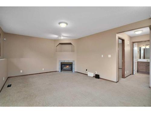 97 Kingston Drive, Red Deer, AB - Indoor With Fireplace