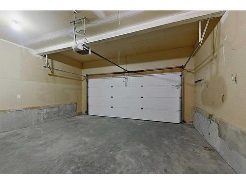 65 Rolling Hills Ridge, Blackfalds, AB - Indoor Photo Showing Garage