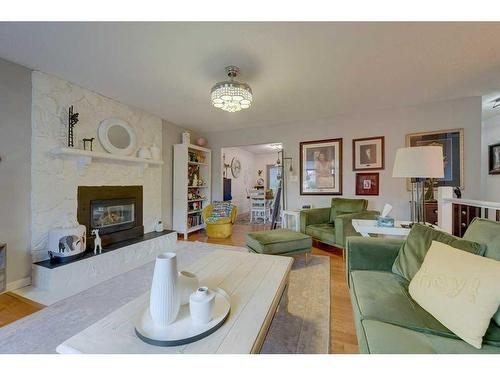 49 Chappel Drive, Red Deer, AB - Indoor Photo Showing Living Room With Fireplace