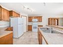 10-51 Carpenter Street, Red Deer, AB  - Indoor Photo Showing Kitchen With Double Sink 