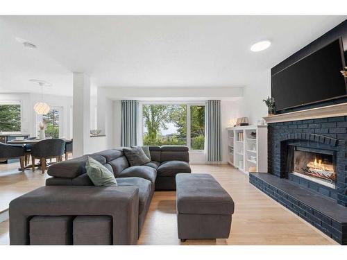 14306 Evergreen Street Sw, Calgary, AB - Indoor Photo Showing Living Room With Fireplace