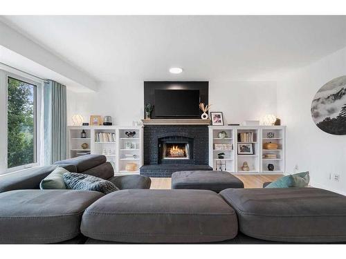 14306 Evergreen Street Sw, Calgary, AB - Indoor Photo Showing Living Room With Fireplace