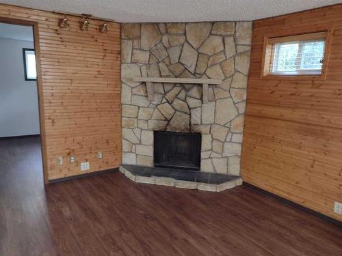 1502 40 Street Se, Calgary, AB - Indoor Photo Showing Living Room With Fireplace