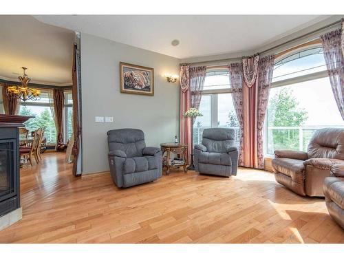 36075 Range Road 281, Rural Red Deer County, AB - Indoor Photo Showing Living Room With Fireplace