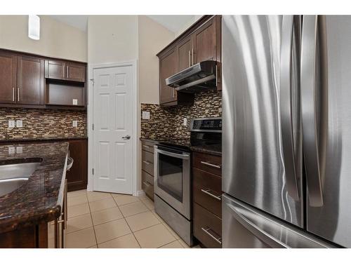 9-5021 34 Avenue, Camrose, AB - Indoor Photo Showing Kitchen With Stainless Steel Kitchen With Upgraded Kitchen