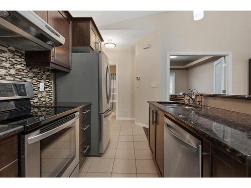 9-5021 34 Avenue, Camrose, AB - Indoor Photo Showing Kitchen With Stainless Steel Kitchen With Double Sink