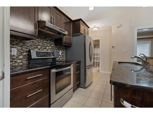 9-5021 34 Avenue, Camrose, AB - Indoor Photo Showing Kitchen With Stainless Steel Kitchen