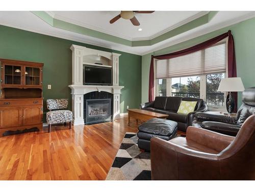 5602 24 Avenue Close, Camrose, AB - Indoor Photo Showing Living Room With Fireplace