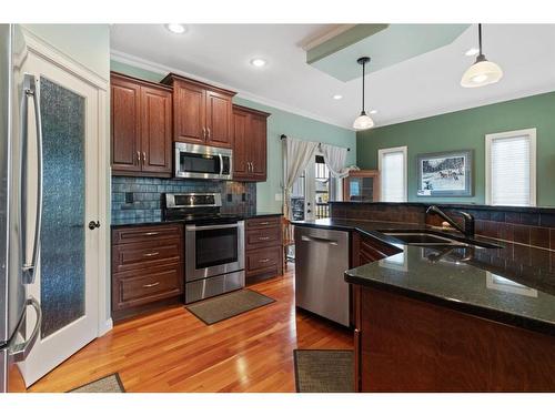 5602 24 Avenue Close, Camrose, AB - Indoor Photo Showing Kitchen With Stainless Steel Kitchen With Double Sink