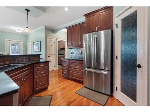 5602 24 Avenue Close, Camrose, AB - Indoor Photo Showing Kitchen With Double Sink