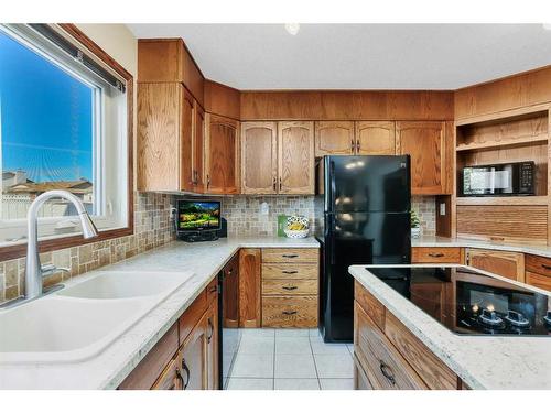 42 Gilbert Crescent, Red Deer, AB - Indoor Photo Showing Kitchen With Double Sink