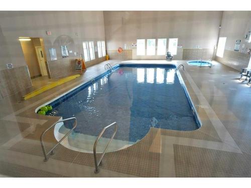 140-10032 Township Road 422, Rural Ponoka County, AB - Indoor Photo Showing Other Room With In Ground Pool