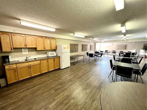 118-4805 45 Street, Red Deer, AB - Indoor Photo Showing Kitchen With Double Sink