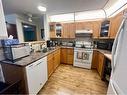 118-4805 45 Street, Red Deer, AB  - Indoor Photo Showing Kitchen With Double Sink 