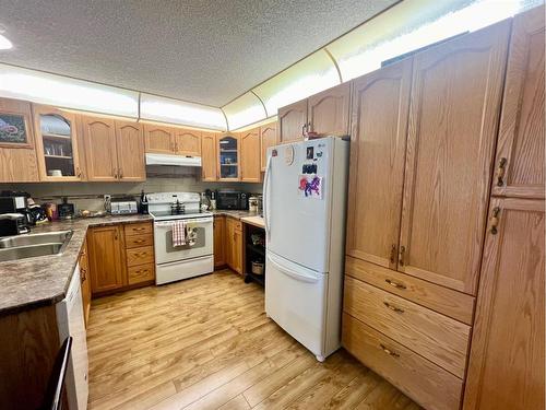 118-4805 45 Street, Red Deer, AB - Indoor Photo Showing Kitchen With Double Sink