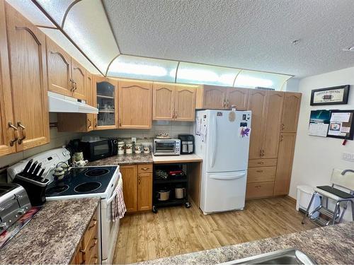 118-4805 45 Street, Red Deer, AB - Indoor Photo Showing Kitchen With Double Sink