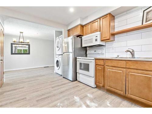 5920 51 Avenue, Red Deer, AB - Indoor Photo Showing Kitchen With Double Sink