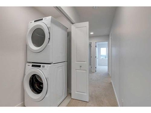 8494 19 Avenue Se, Calgary, AB - Indoor Photo Showing Laundry Room