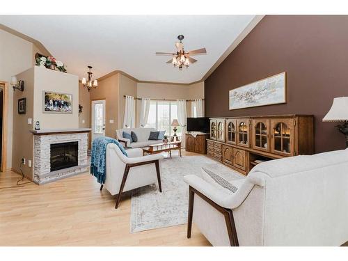 21-39233 Range Road 271, Rural Red Deer County, AB - Indoor Photo Showing Living Room With Fireplace