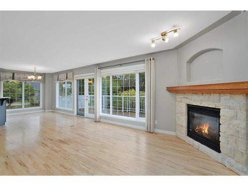 35 Weddell Crescent, Red Deer, AB - Indoor Photo Showing Living Room With Fireplace