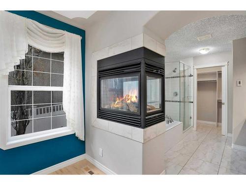 35 Weddell Crescent, Red Deer, AB - Indoor Photo Showing Other Room With Fireplace