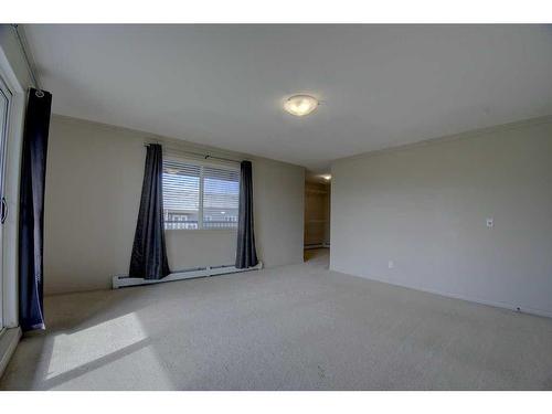 404-5601 Kerry Wood Drive, Red Deer, AB - Indoor Photo Showing Other Room