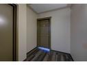 404-5601 Kerry Wood Drive, Red Deer, AB  - Indoor Photo Showing Other Room 