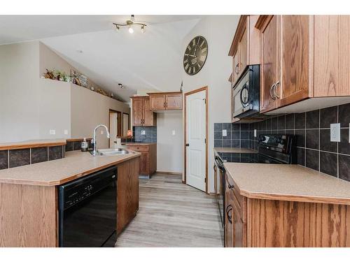 518 Lancaster Drive, Red Deer, AB - Indoor Photo Showing Kitchen With Double Sink