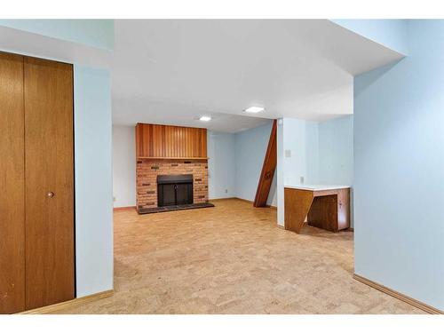 4221 33 Street, Red Deer, AB - Indoor With Fireplace