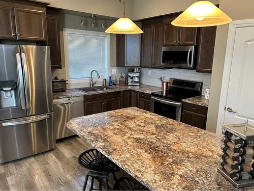 50 Village Crescent, Red Deer, AB - Indoor Photo Showing Kitchen With Double Sink