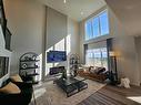 76 Key Cove Sw, Airdrie, AB  - Indoor With Fireplace 