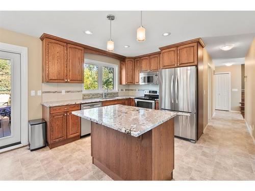 209-27475 Township Road 380, Rural Red Deer County, AB - Indoor Photo Showing Kitchen With Stainless Steel Kitchen With Double Sink